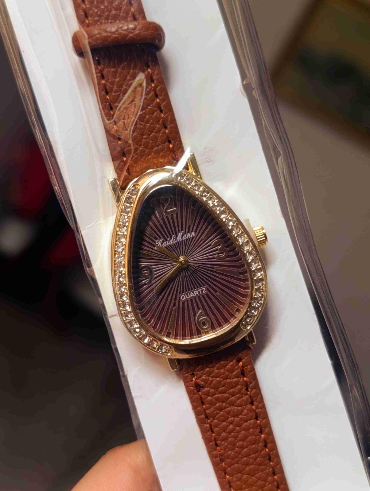 Reloj de pulsera para mujer con correa marrón y esfera en forma de gota, foto 2 de 2