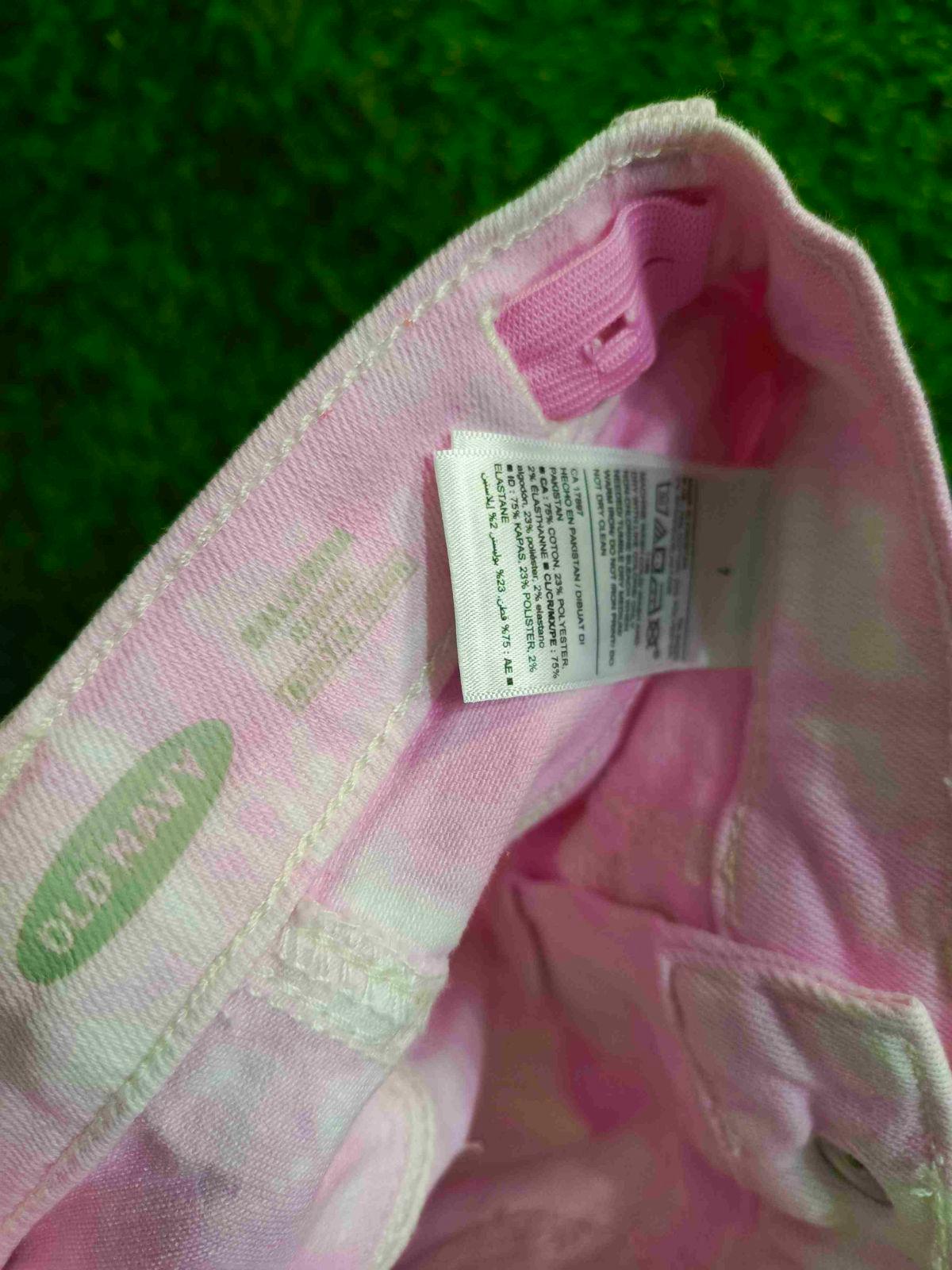 Jeans Old Navy para niña efecto desteñido rosado y blanco, foto 3 de 3
