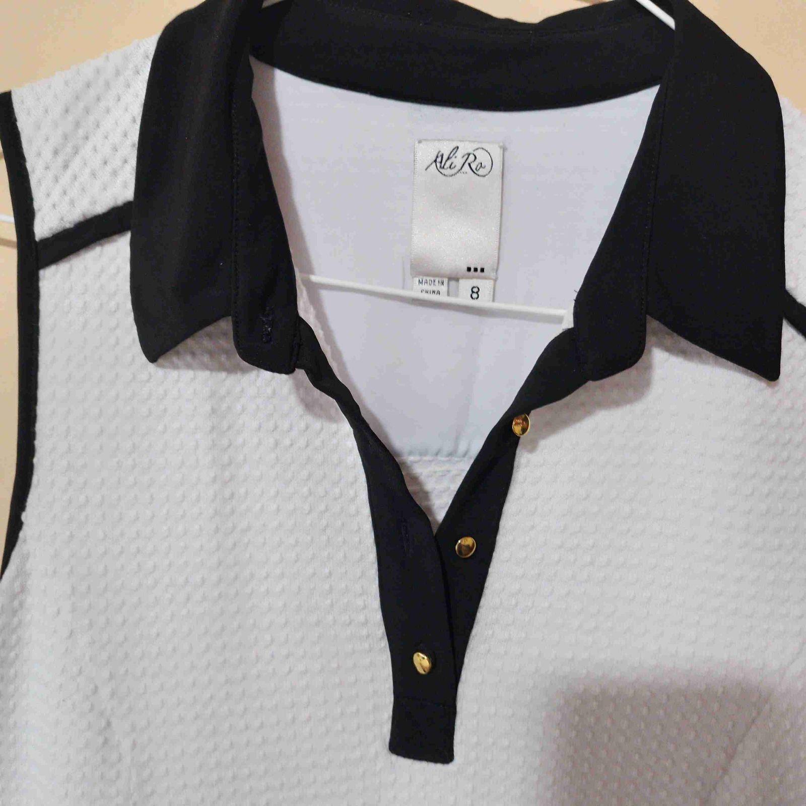 Vestido corto blanco con detalles negros, foto 2 de 3
