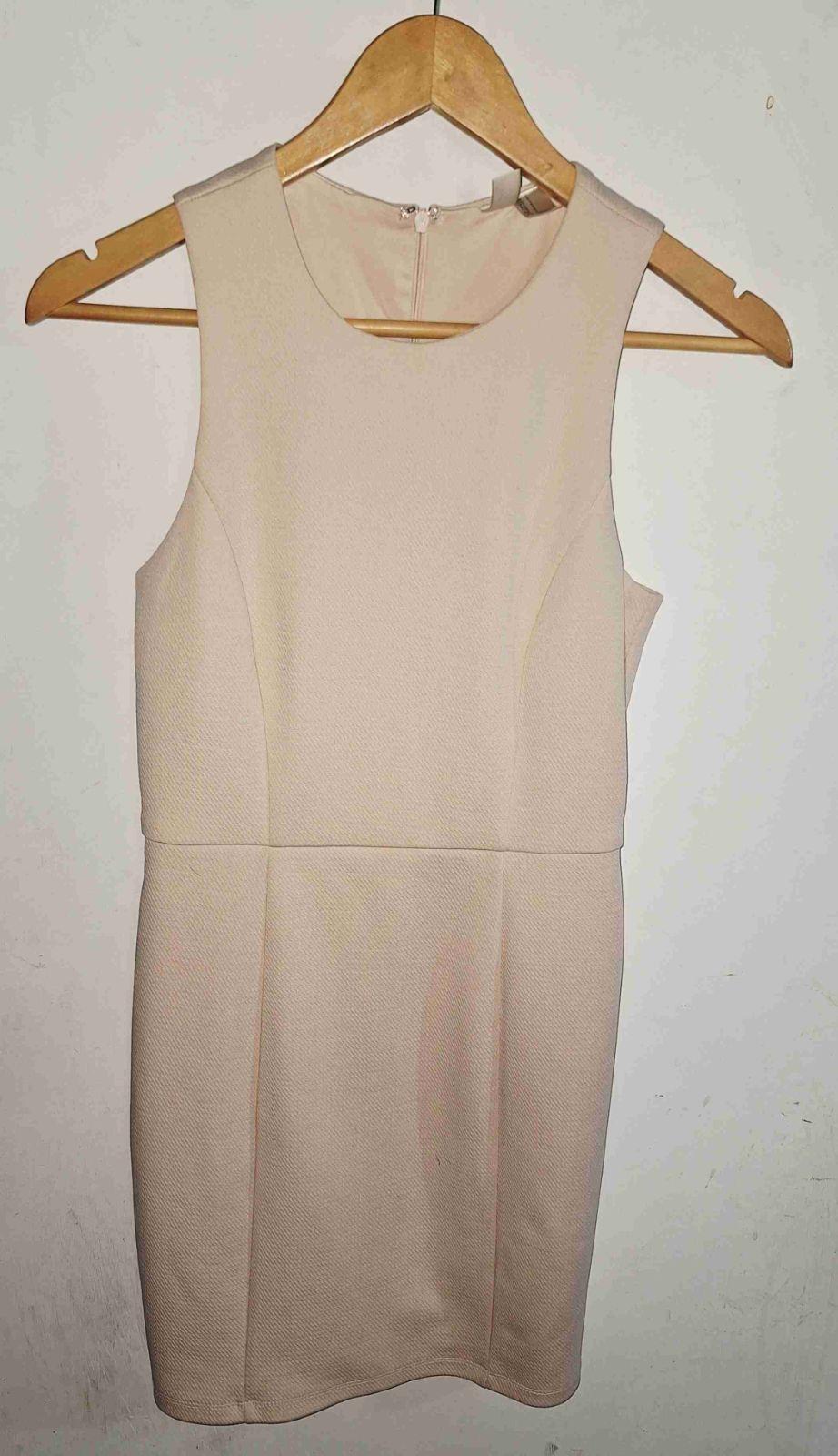 Vestido corto rosa bebe sin mangas, foto 2 de 4