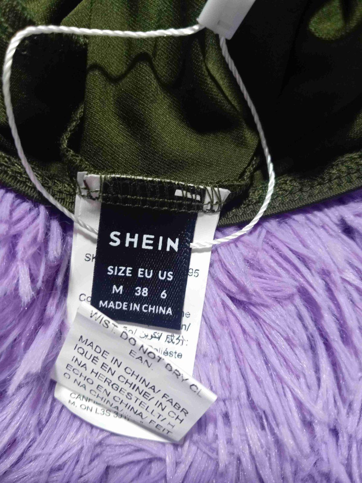 Top strapless verde oscuro con estrella de pedrería, foto 3 de 3