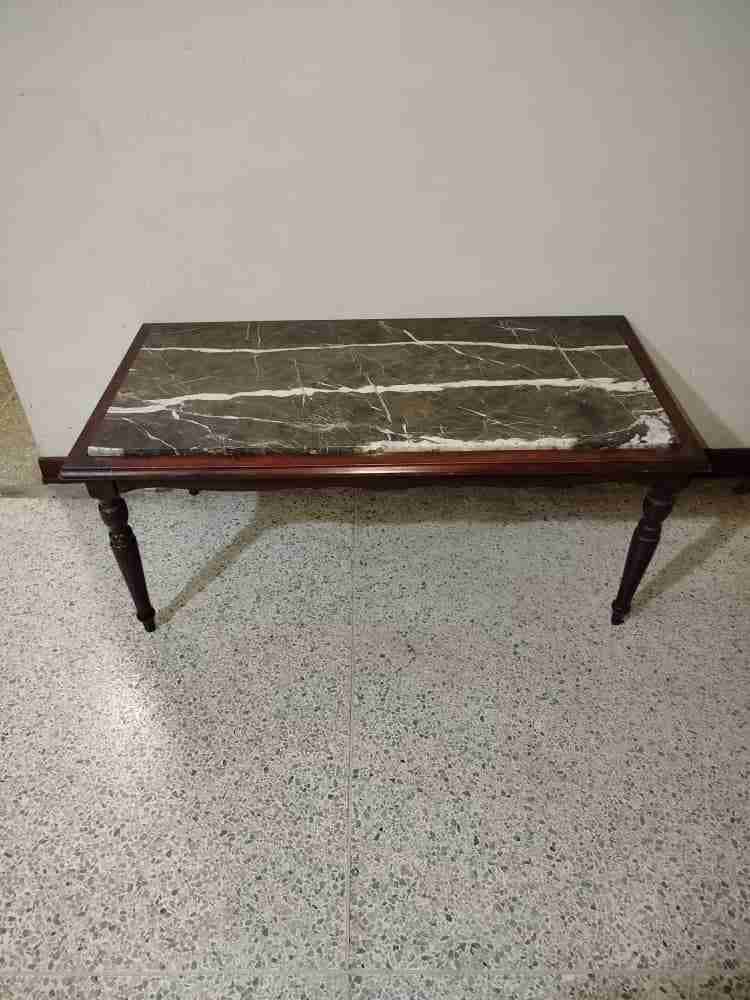 Mesa de centro con tope de mármol y base de madera, foto 3 de 4