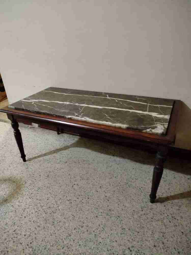 Mesa de centro con tope de mármol y base de madera, foto 2 de 4