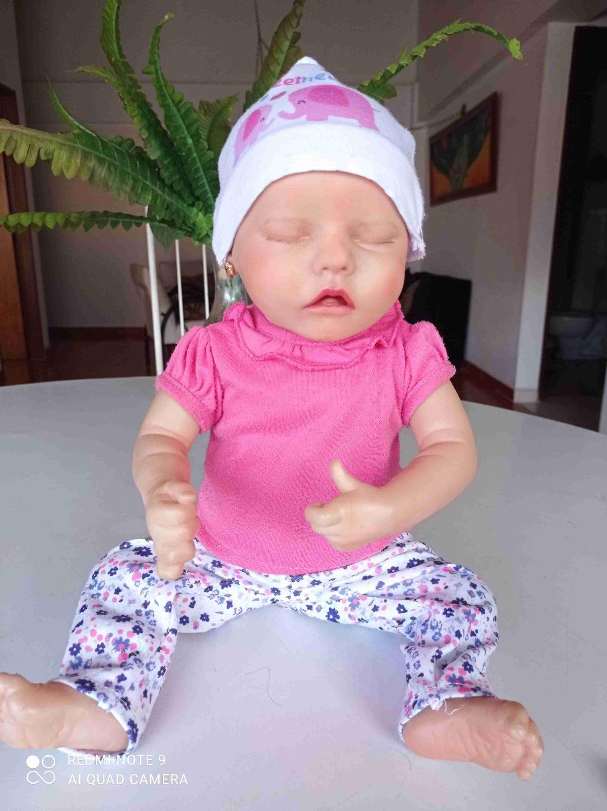 Muñeca Reborn con accesorios y ropa, foto 7 de 7