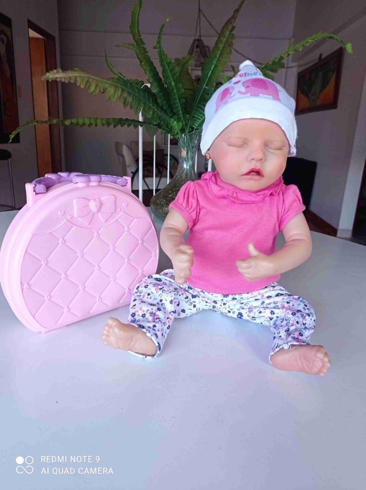 Muñeca Reborn con accesorios y ropa, foto 3 de 7