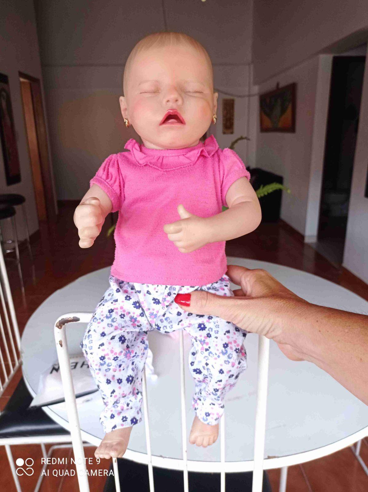 Muñeca Reborn con accesorios y ropa, foto 5 de 7