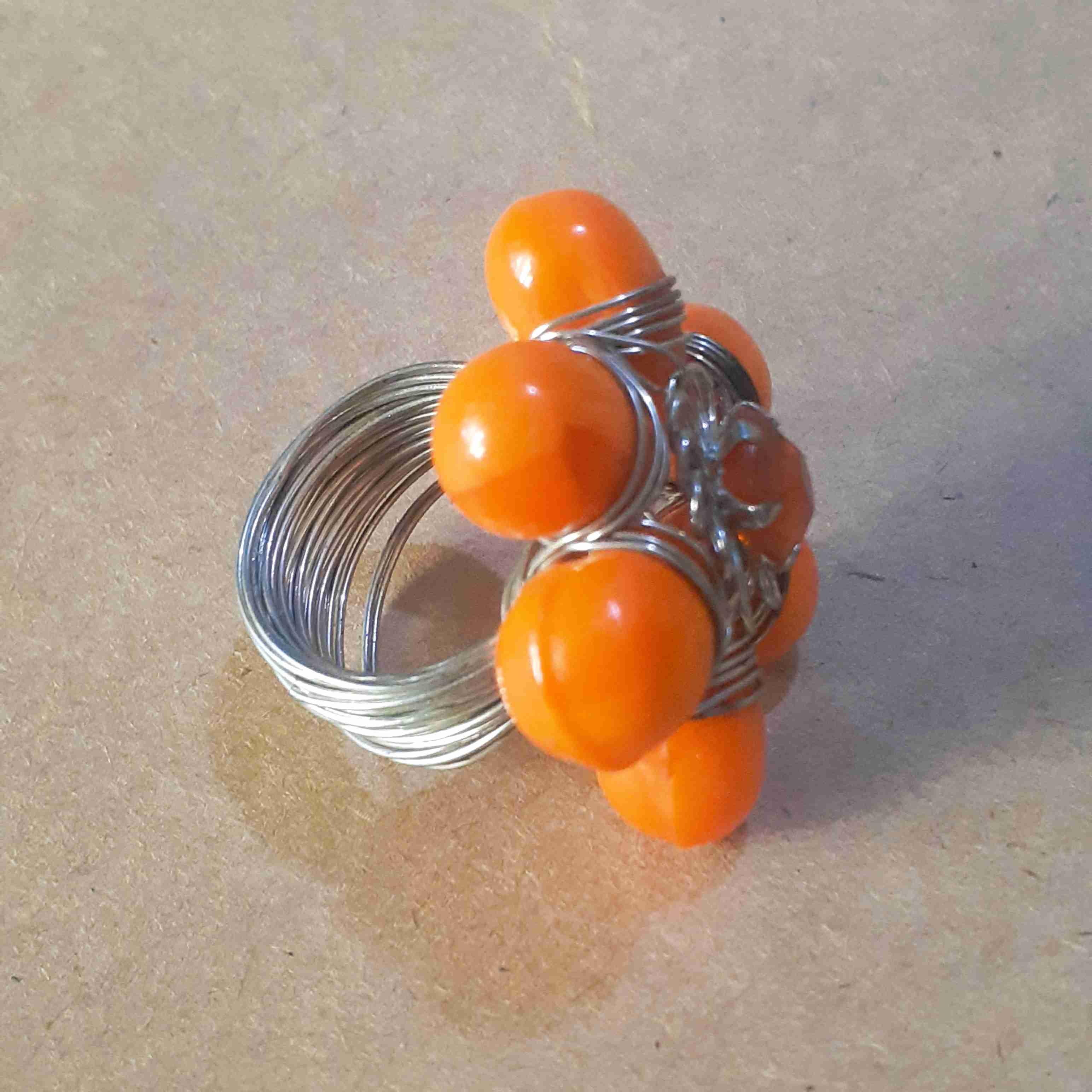 Anillo flor naranja, foto 2 de 2