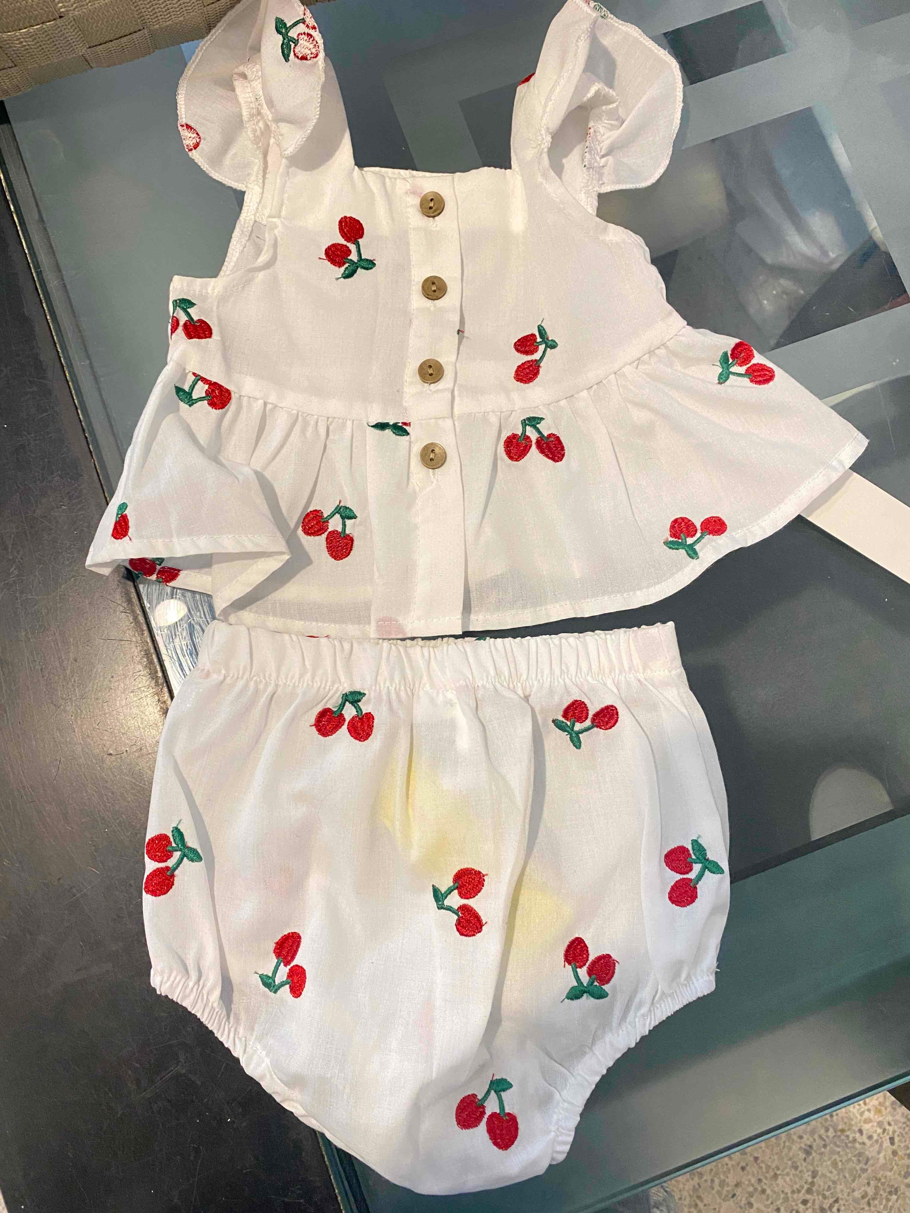Conjunto 6-9 meses, foto 2 de 2