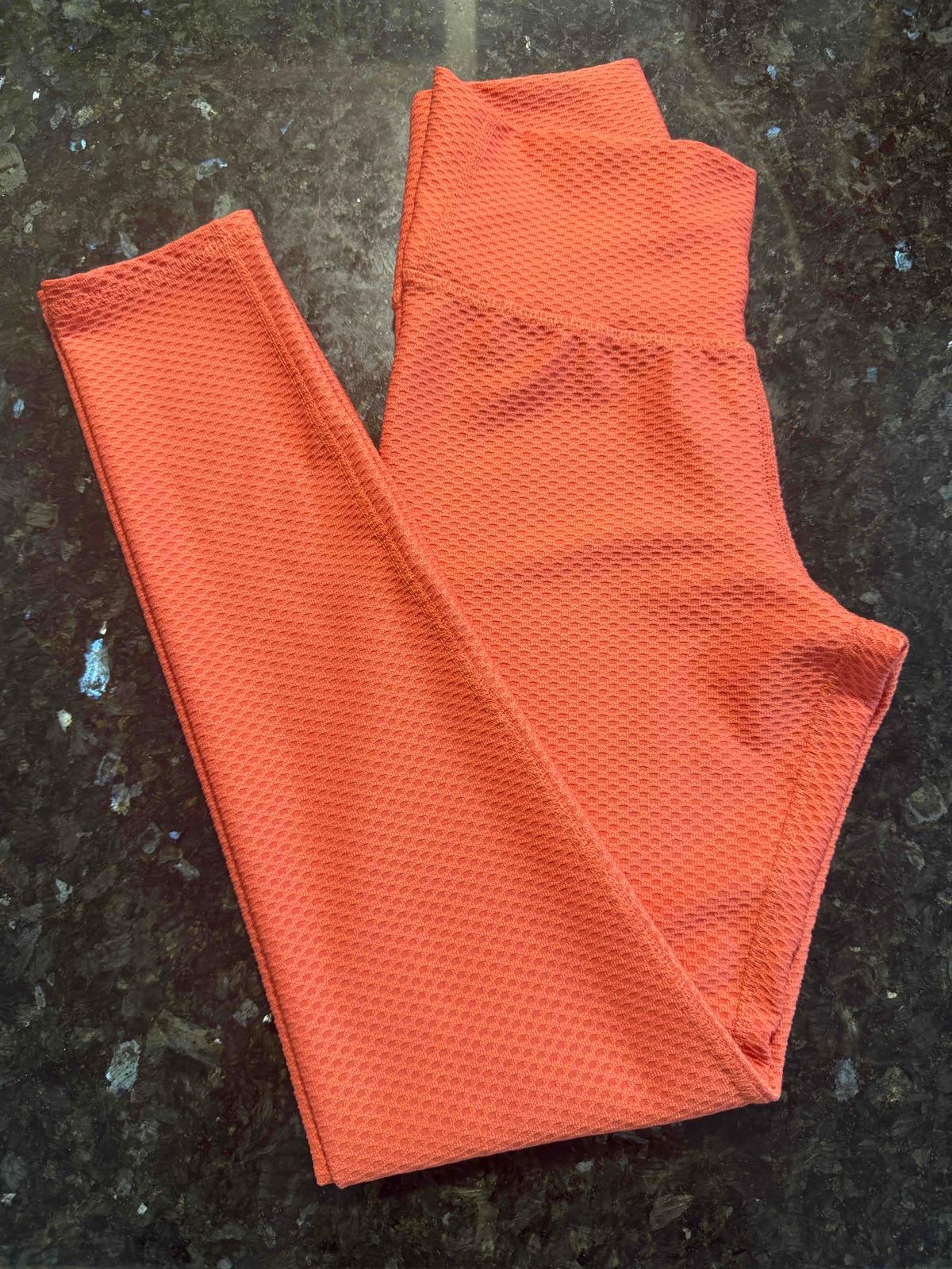 Leggings deportivos color naranja texturizado, foto 1 de 3