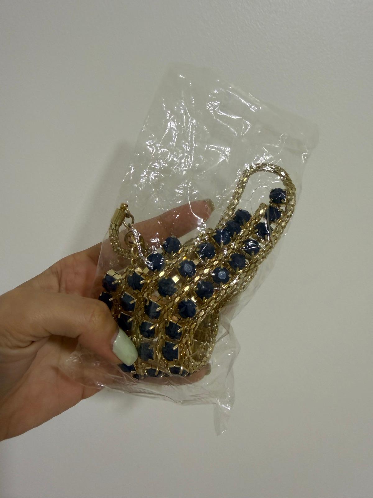 Collar dorado con piedras azules, foto 3 de 3