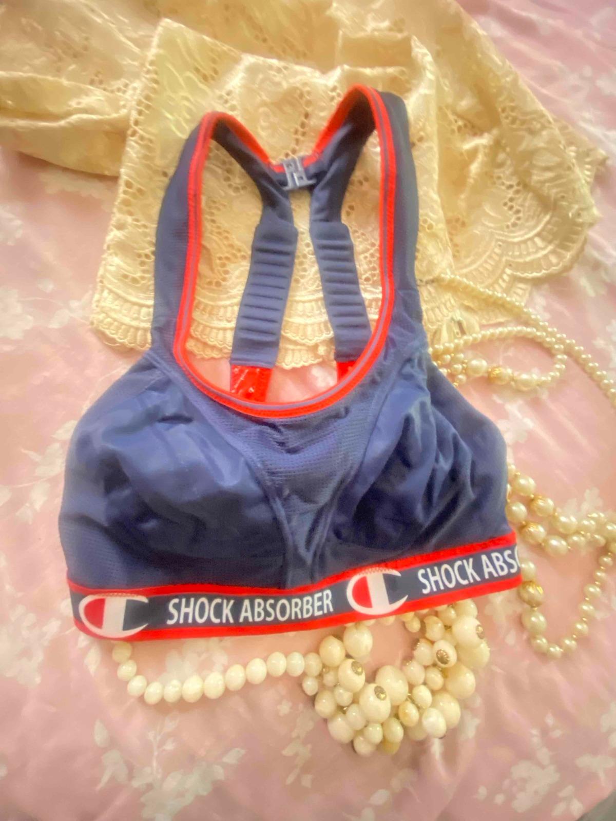 Top deportivo Shock Absorber azul y rojo, foto 2 de 3