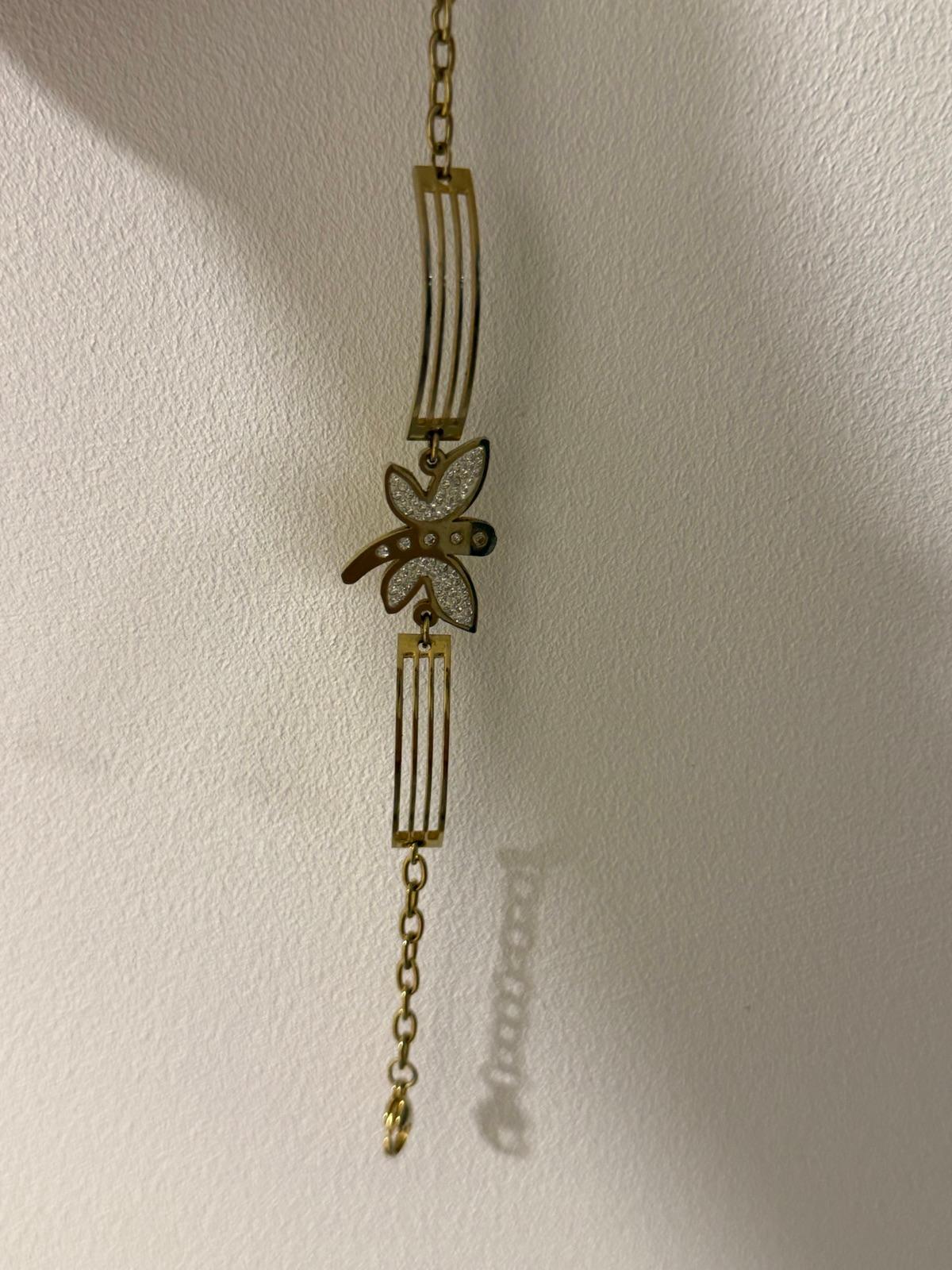 Pulsera dorada con dije de libélula y piedras, foto 2 de 2