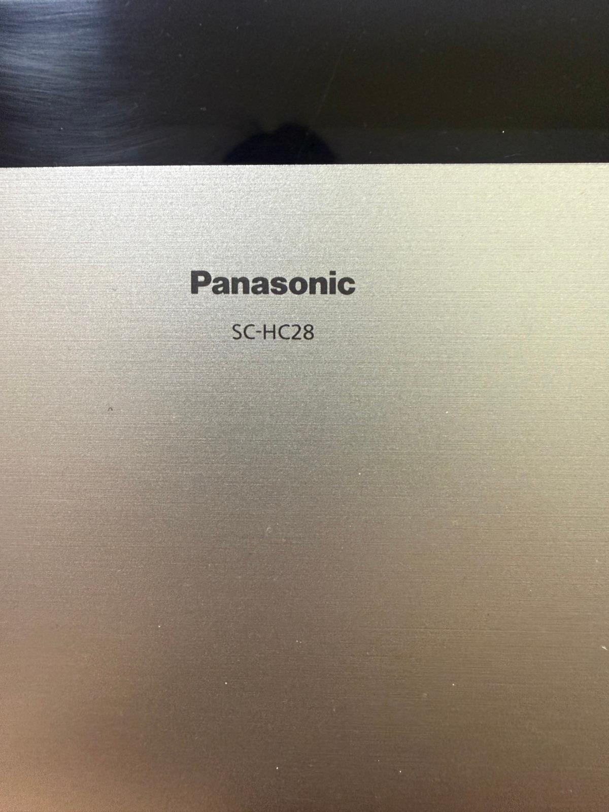 Sistema de audio Panasonic SC-HC28 negro y plateado, foto 2 de 3