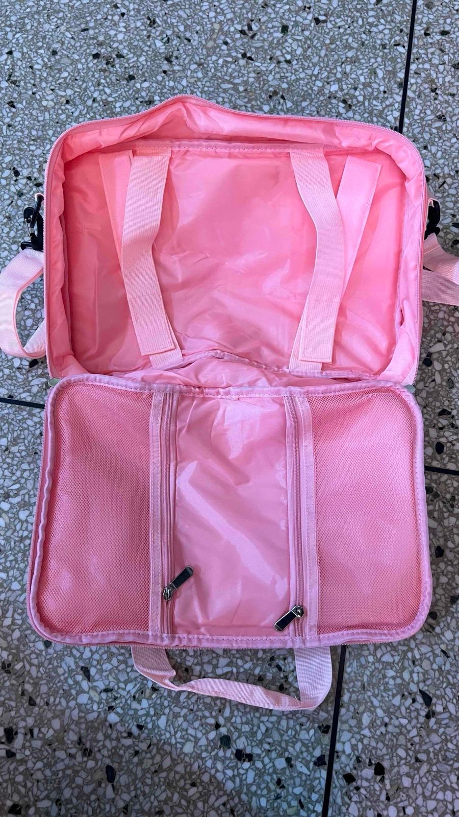 Bolso de viaje color rosa con franja, foto 2 de 2