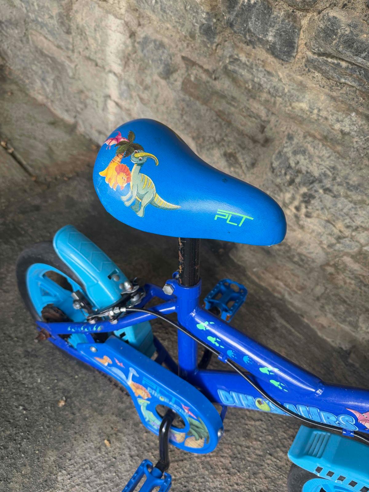 Bicicleta infantil azul de dinosaurios, foto 4 de 5