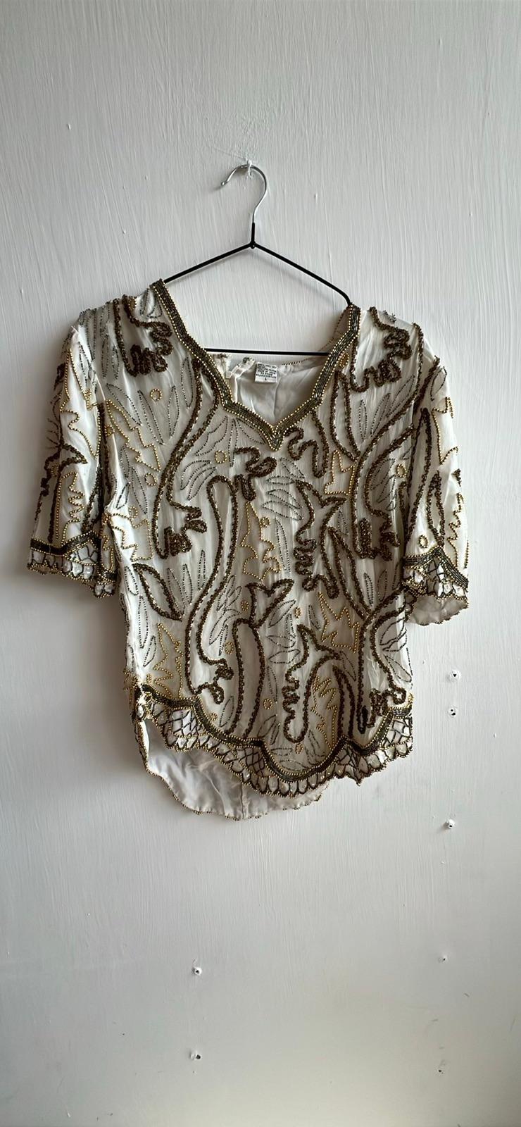Blusa blanca con bordados dorados, foto 1 de 1