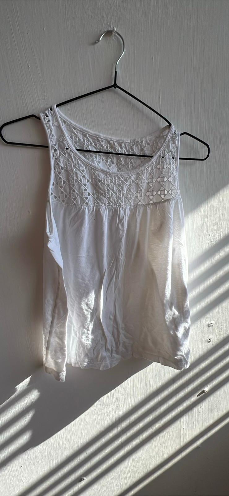 Blusa blanca sin mangas, foto 1 de 1