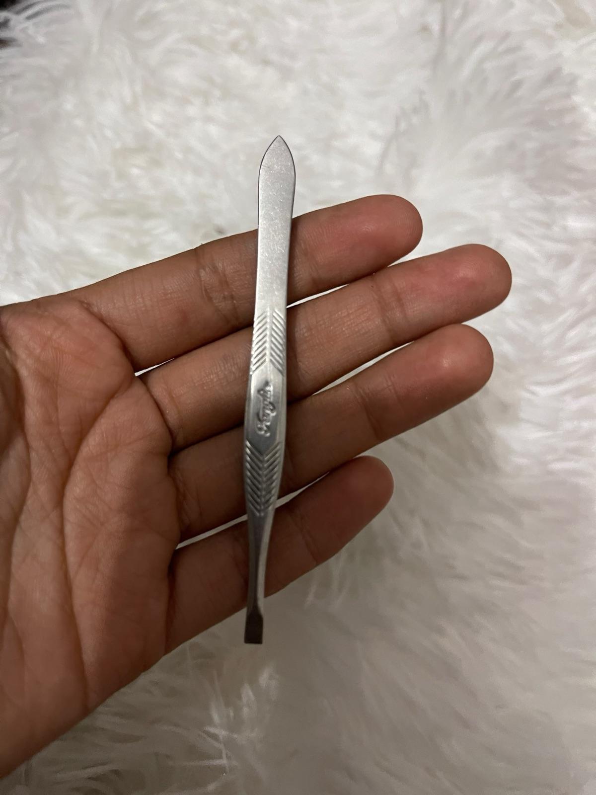 Pinza metálica de depilar, foto 1 de 1