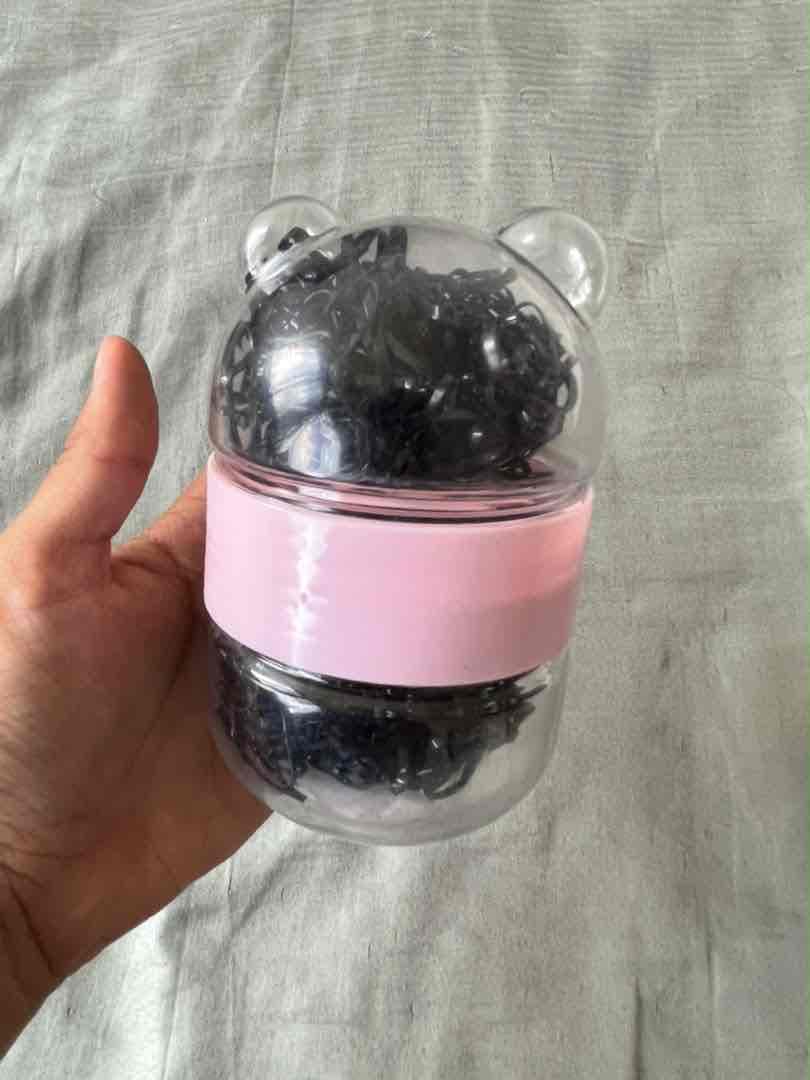 Estuche transparente con ligas para el cabello, foto 1 de 2